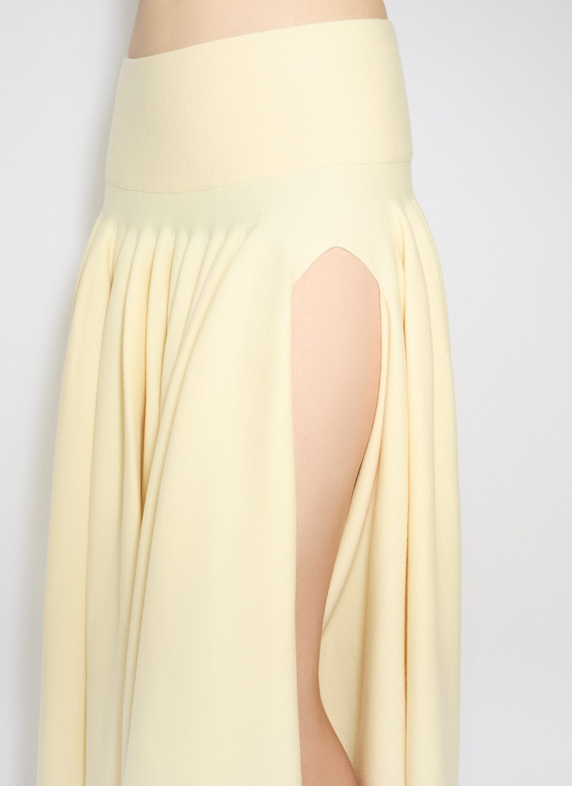 PLEATED SKIRT IN TIGHT GODET KNIT ALAÏA LIGHT YELLOW PLEATED SKIRT IN TIGHT GODET KNIT